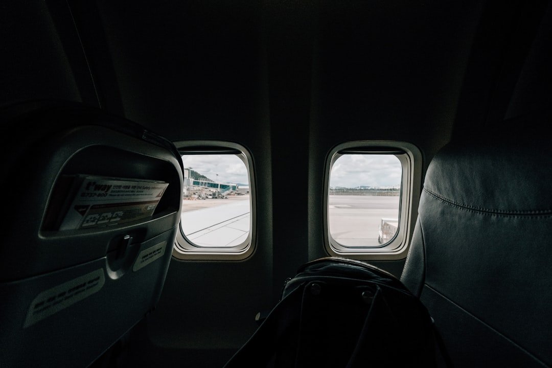a view of the inside of an airplane looking out the window