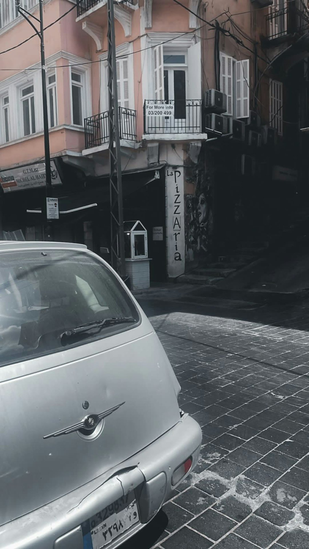 a car parked on the side of a street