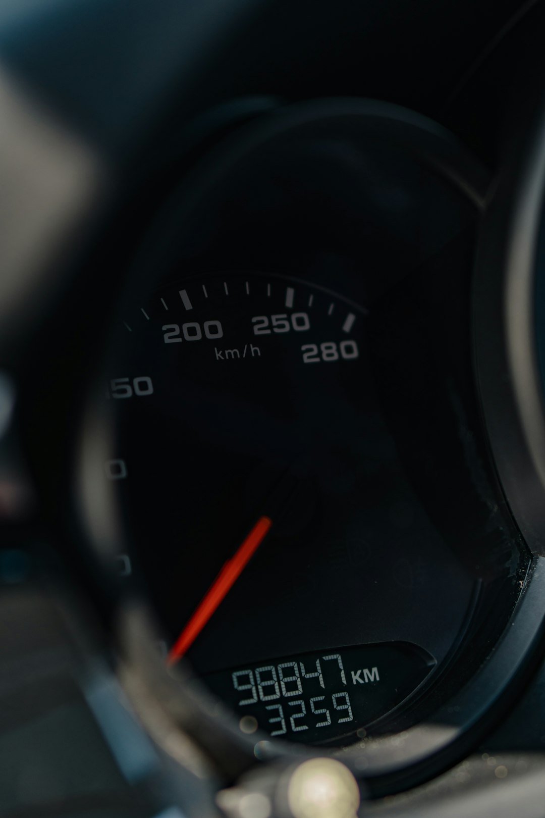 a close up of a speedometer on a motorcycle