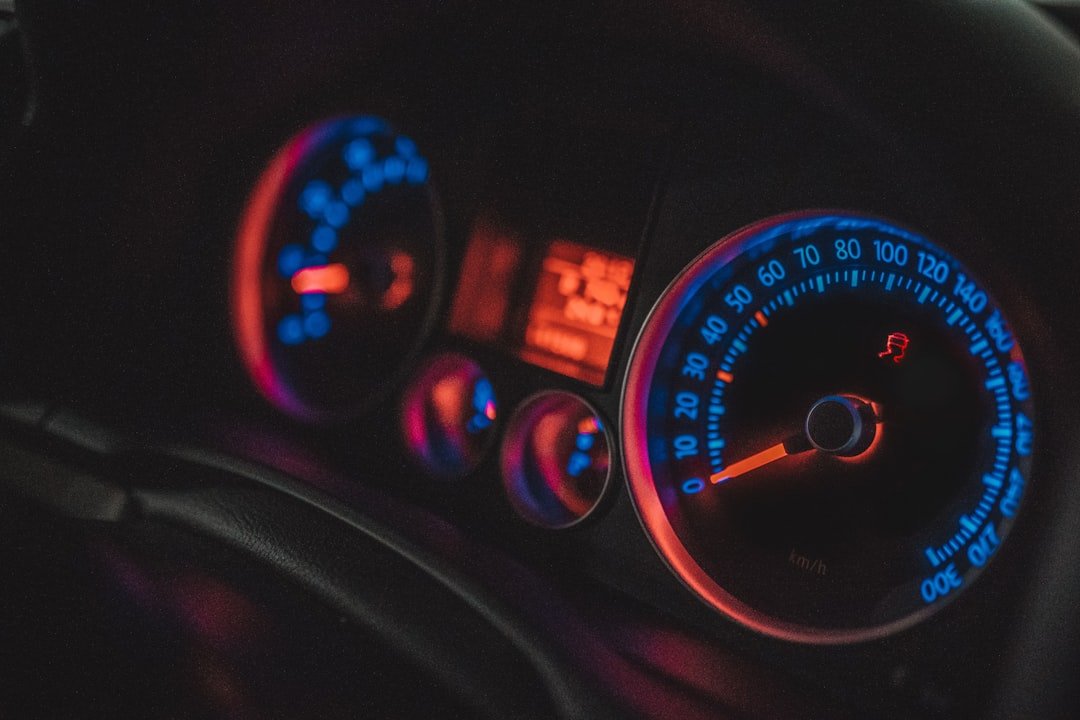 black and white car speedometer