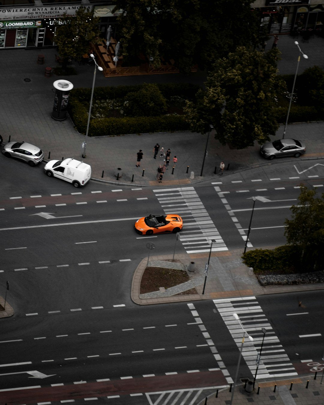 cars parked on parking lot during daytime