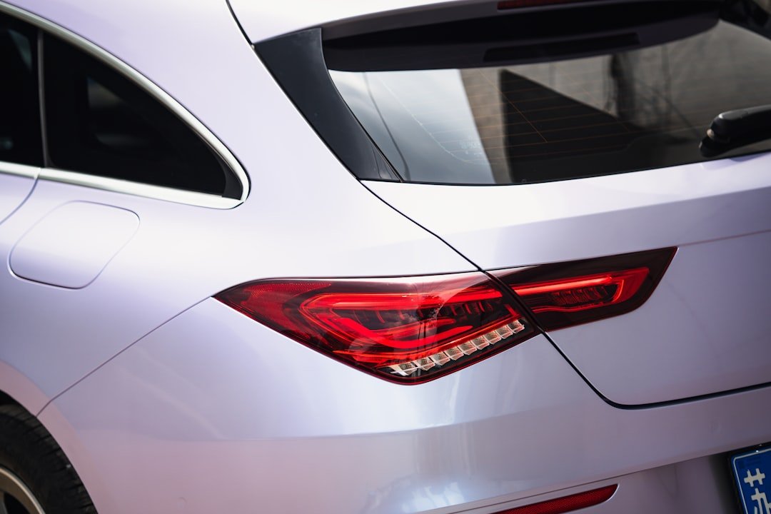 a close up of the tail light of a white car