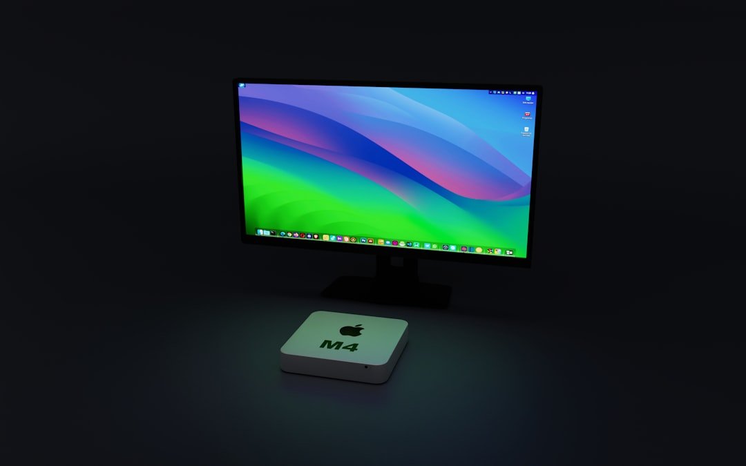 a computer monitor sitting on top of a desk