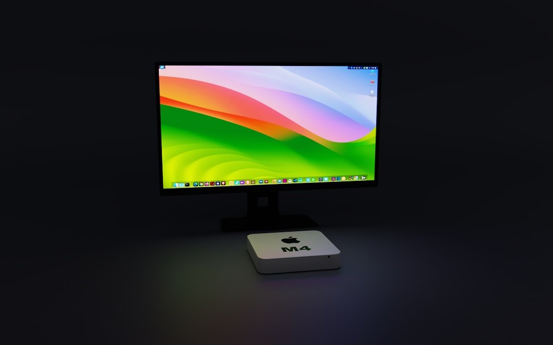 a computer monitor sitting on top of a desk