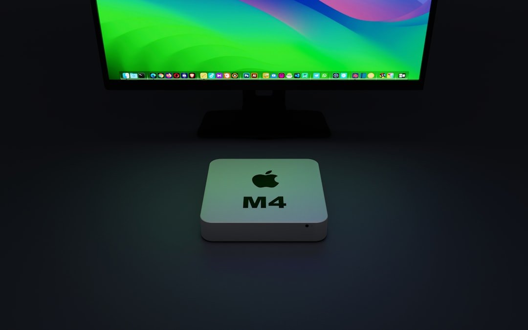 an apple computer with the m4 logo on it