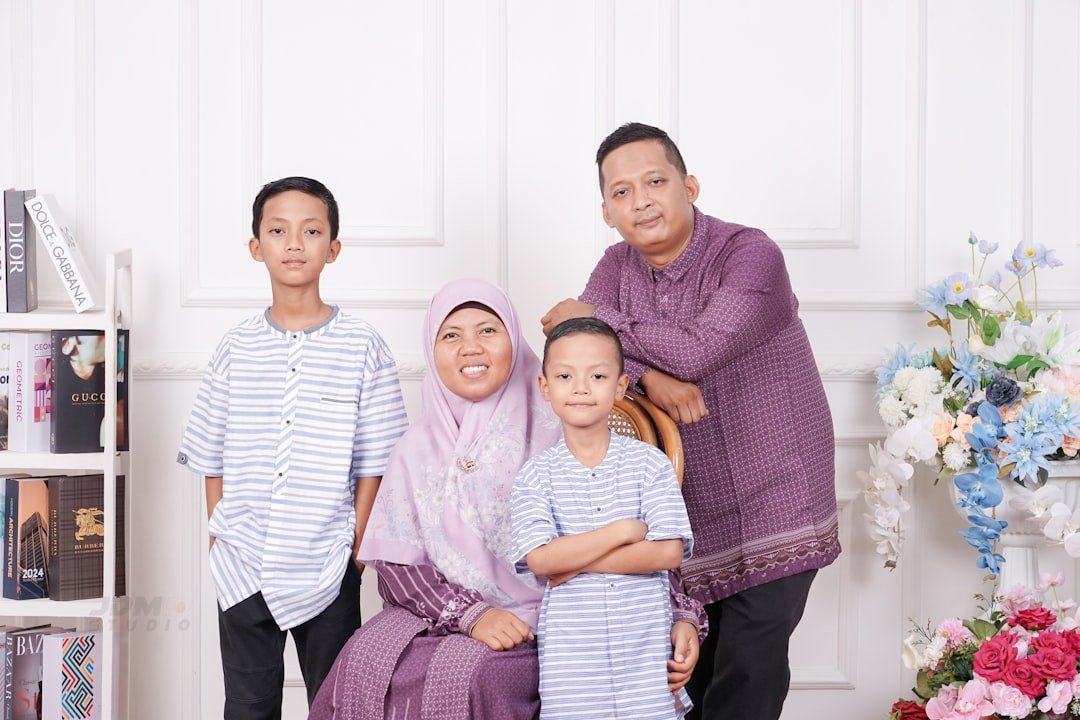 A family poses together for a group photo.