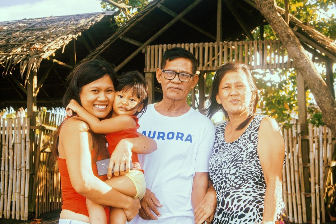 3 women and man smiling