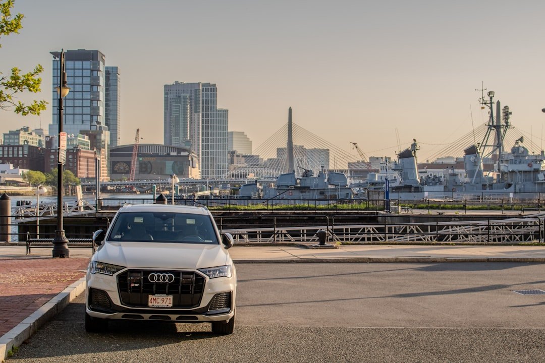 a white car parked on the side of the road