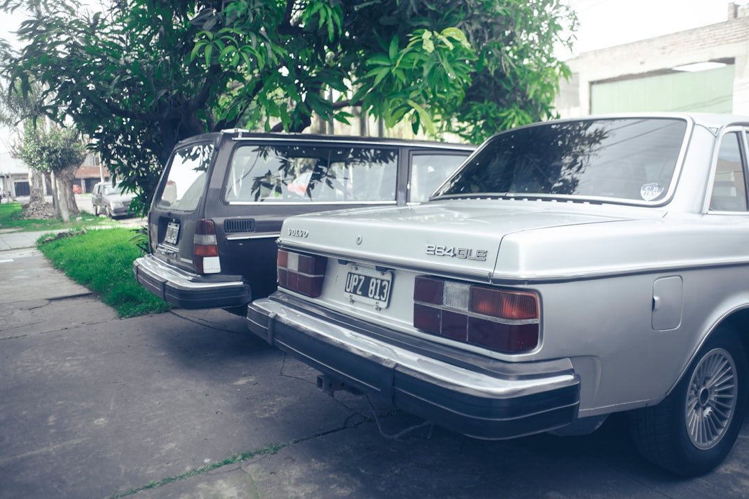 a couple of cars parked next to each other