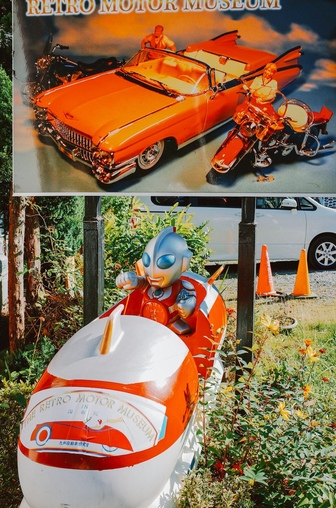 Ultraman rides a retro amusement park ride.