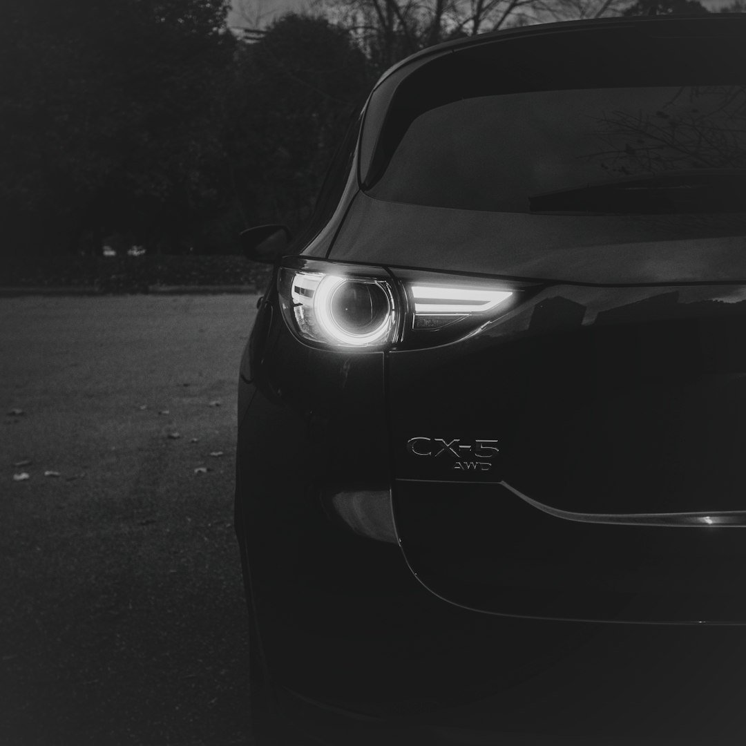 Dark mazda cx-5 with illuminated taillight