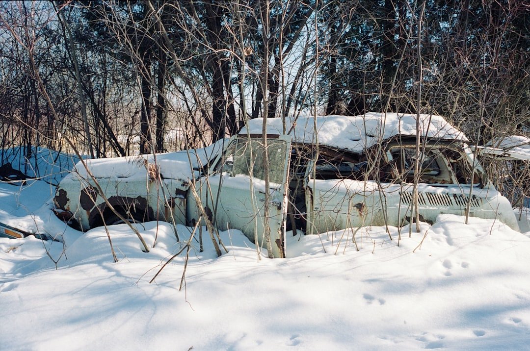 white car covered with snow