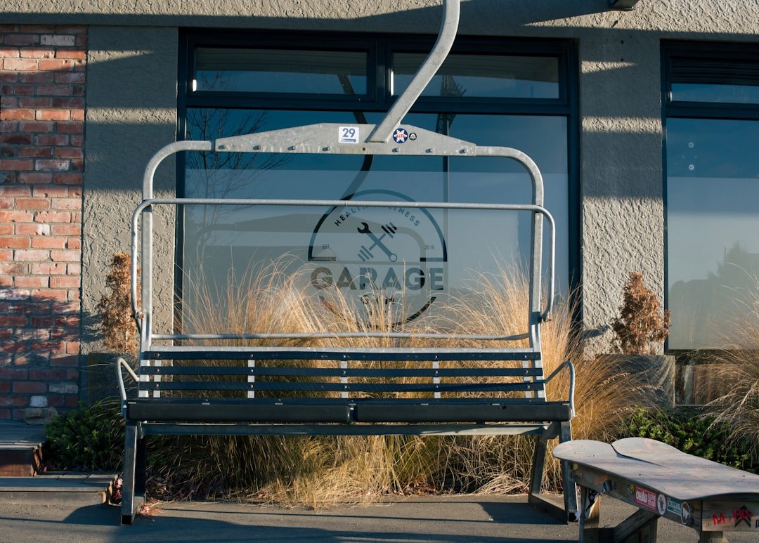 a bench sitting in front of a building
