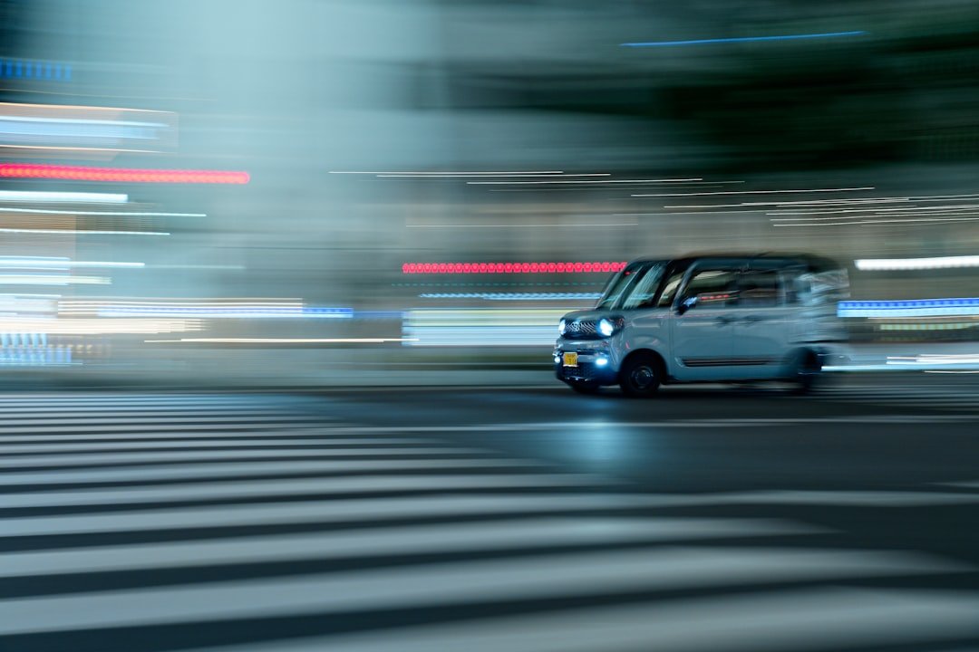 black suv on road during night time