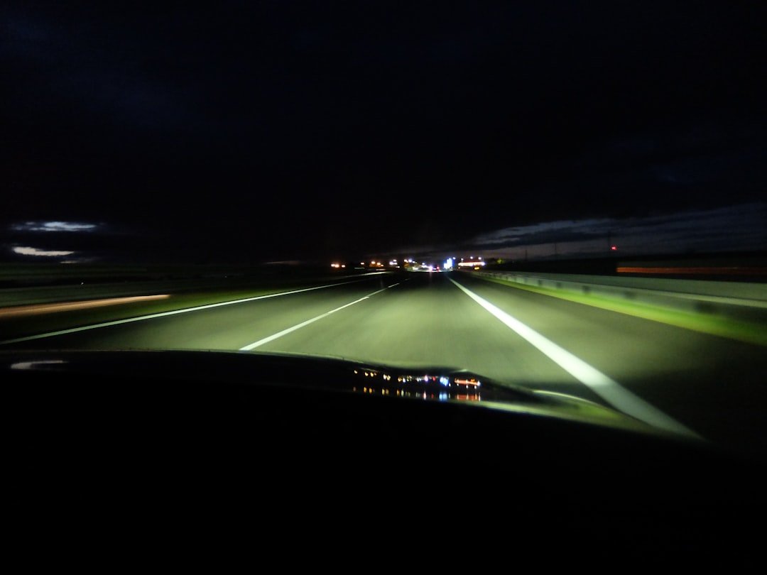 Driving on highway at night with headlights on