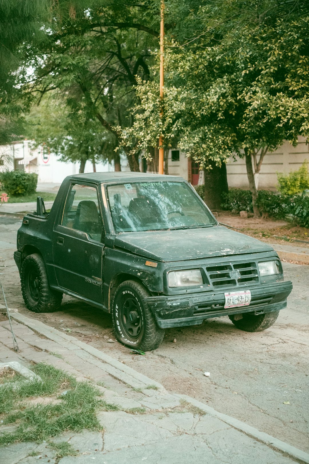 A truck parked on the side of the road