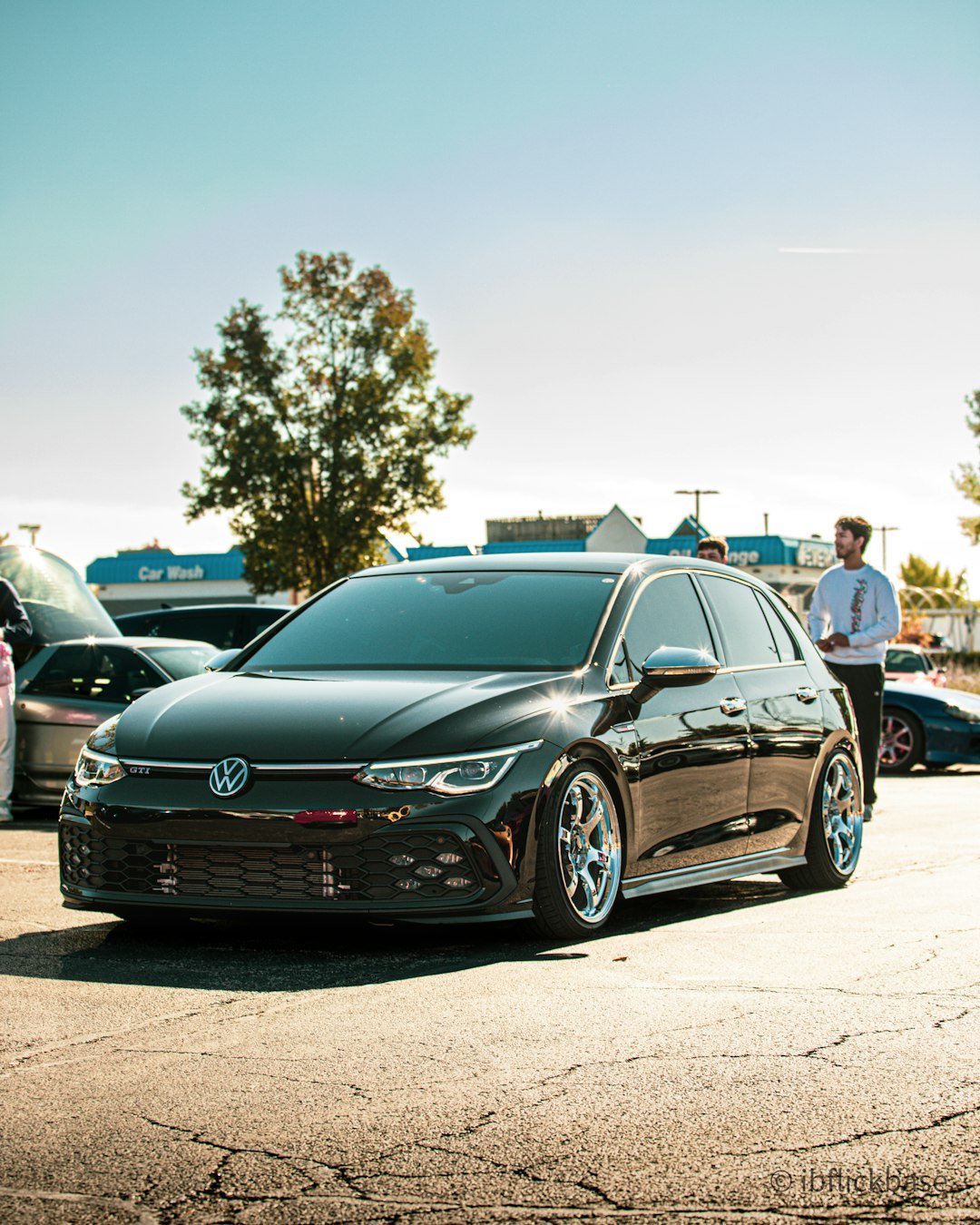 Black volkswagen golf gti parked outdoors