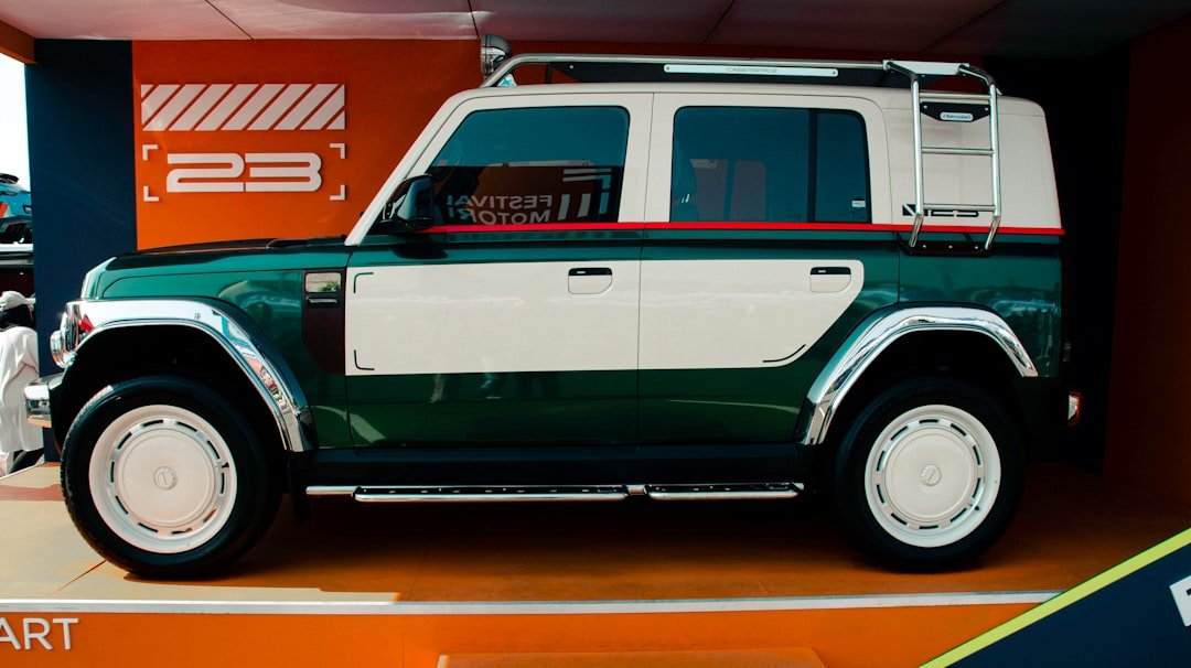 Vintage green and white off-road vehicle