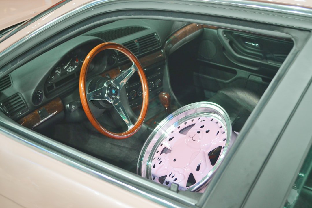 Car interior with custom steering wheel and wheel
