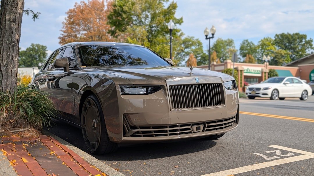 A luxury sedan parked on a street.