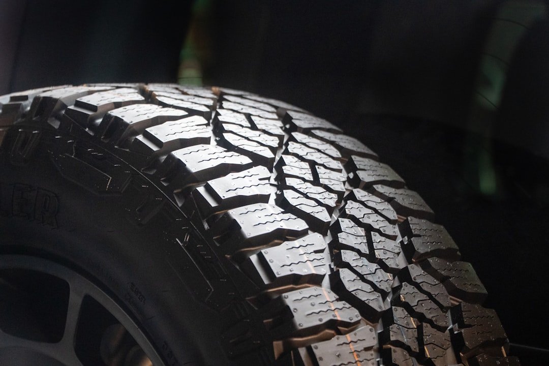Close-up of a tire with a rugged tread.