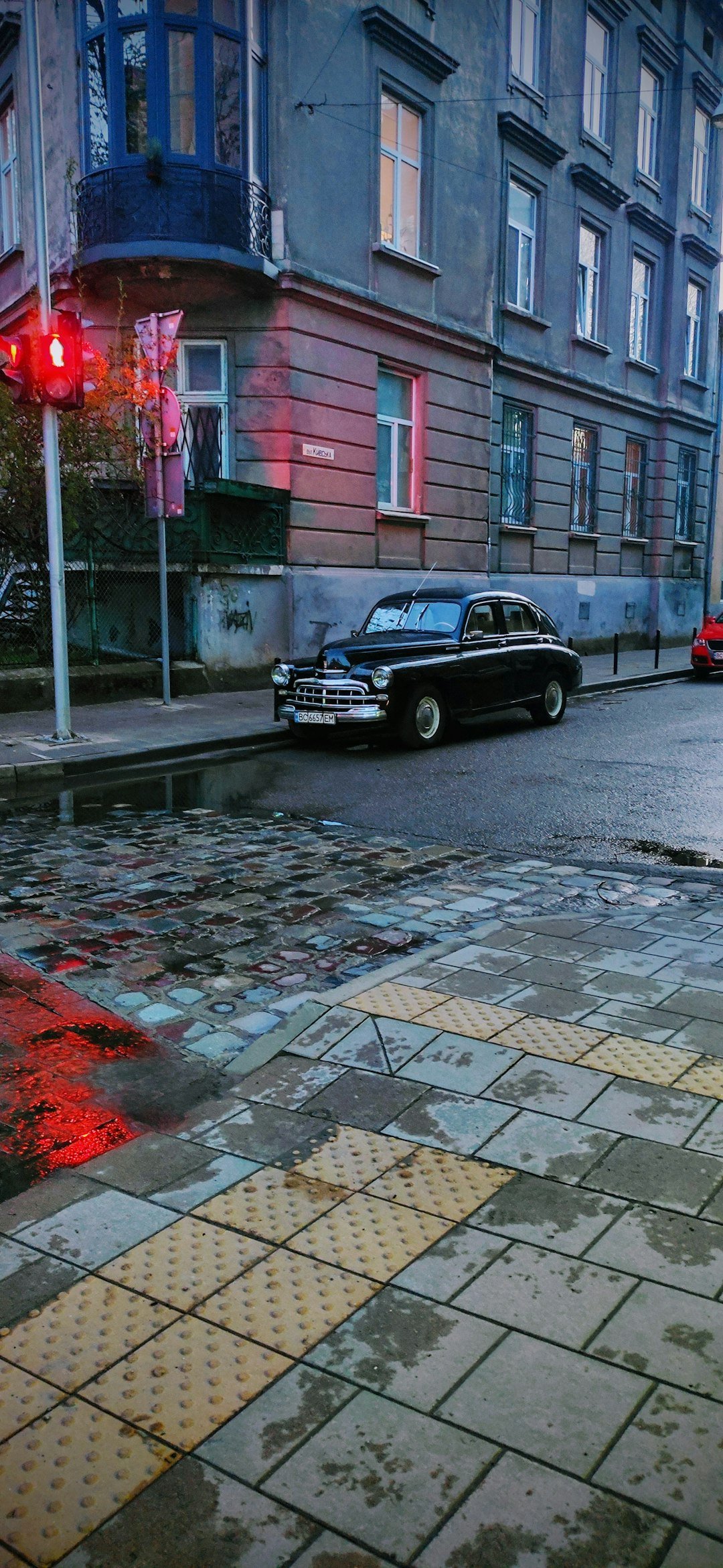 a car parked on the side of a street