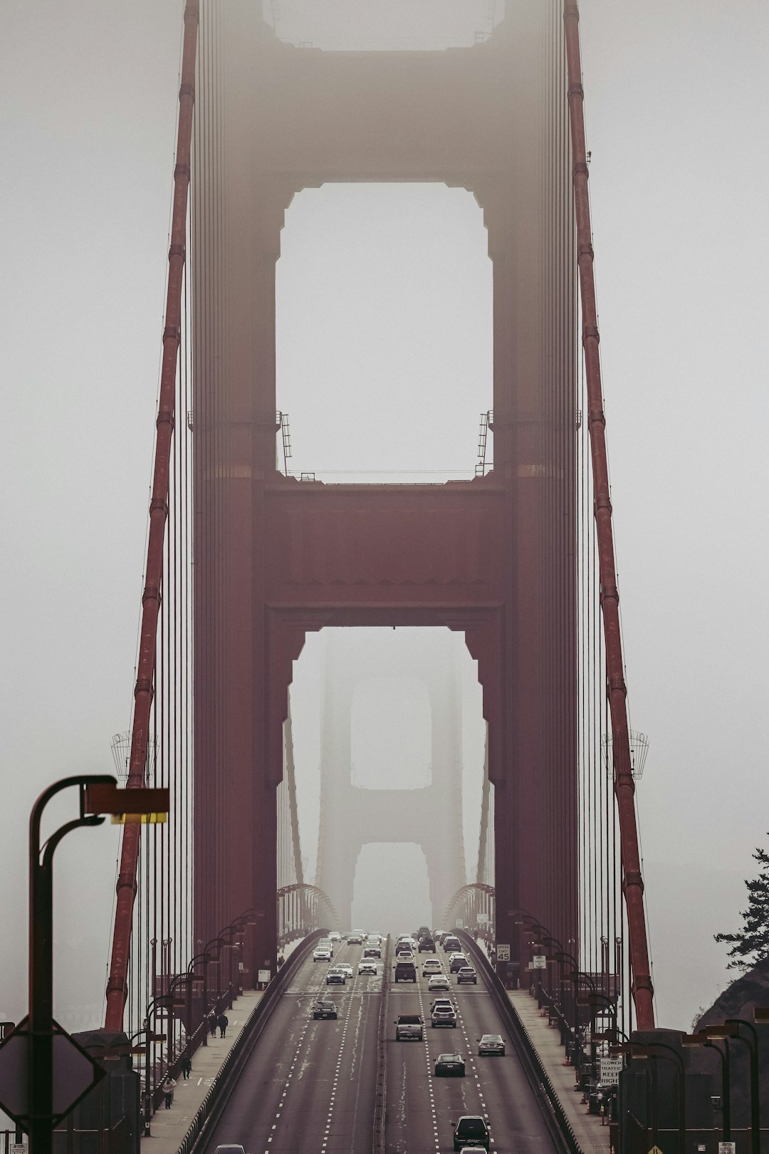 Golden gate bridge towers shrouded in fog