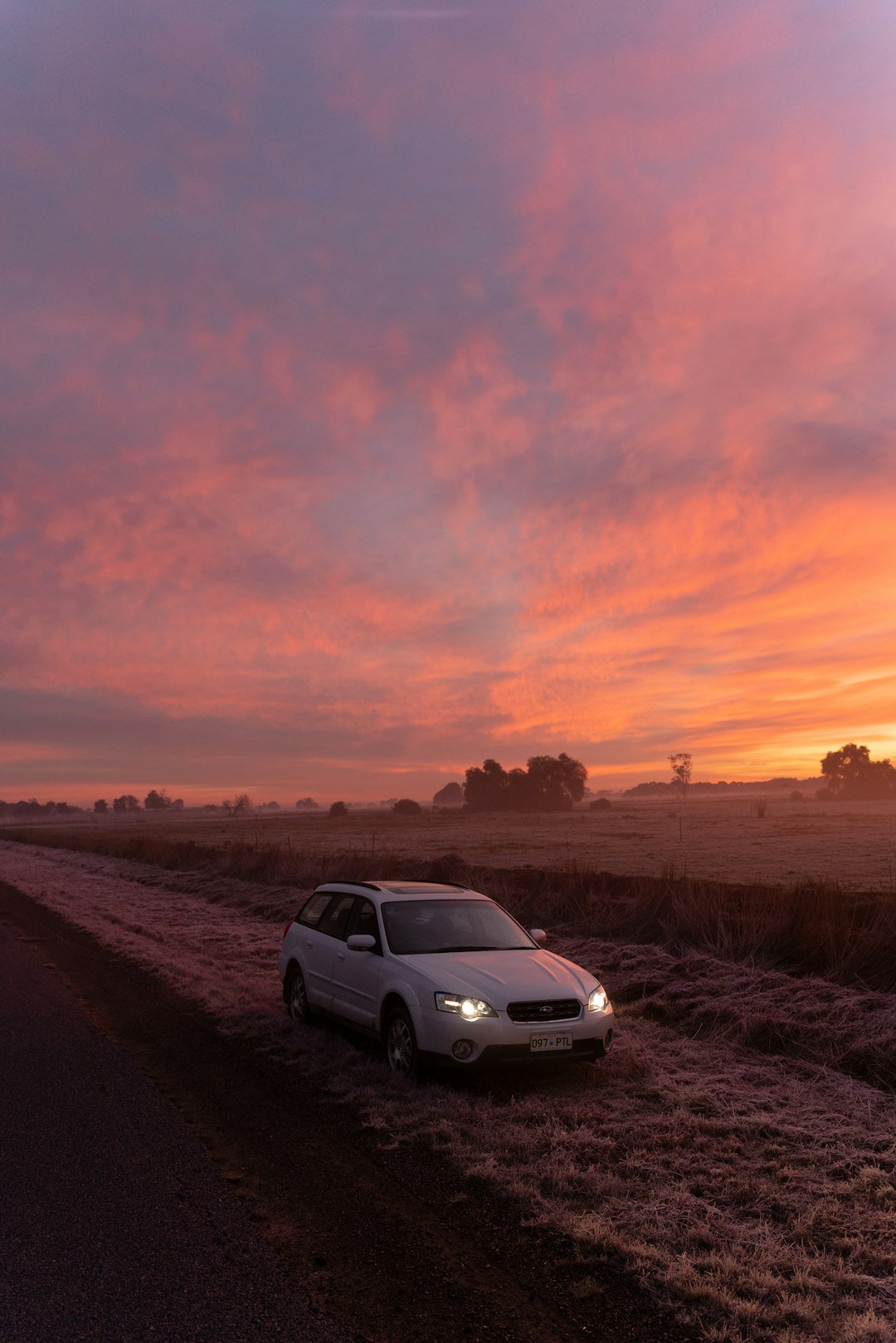 A car is parked on the side of the road