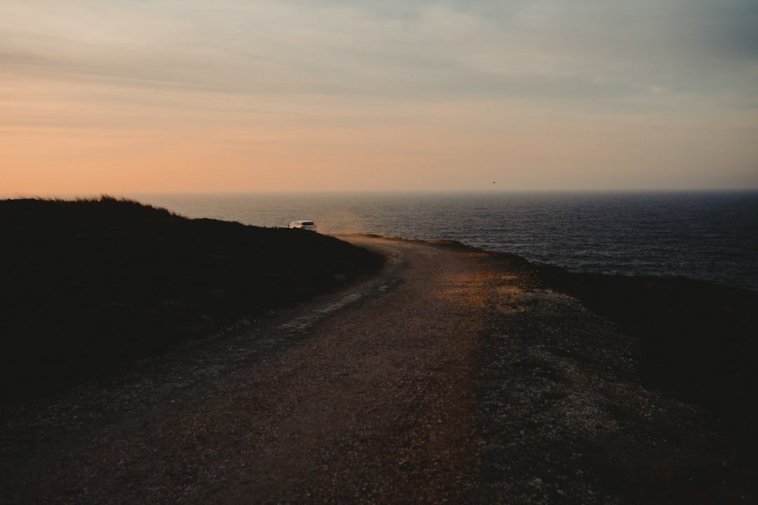 a beach with a boat on it