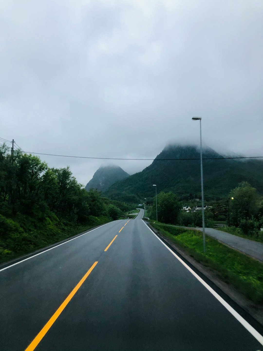 a road with trees on the side