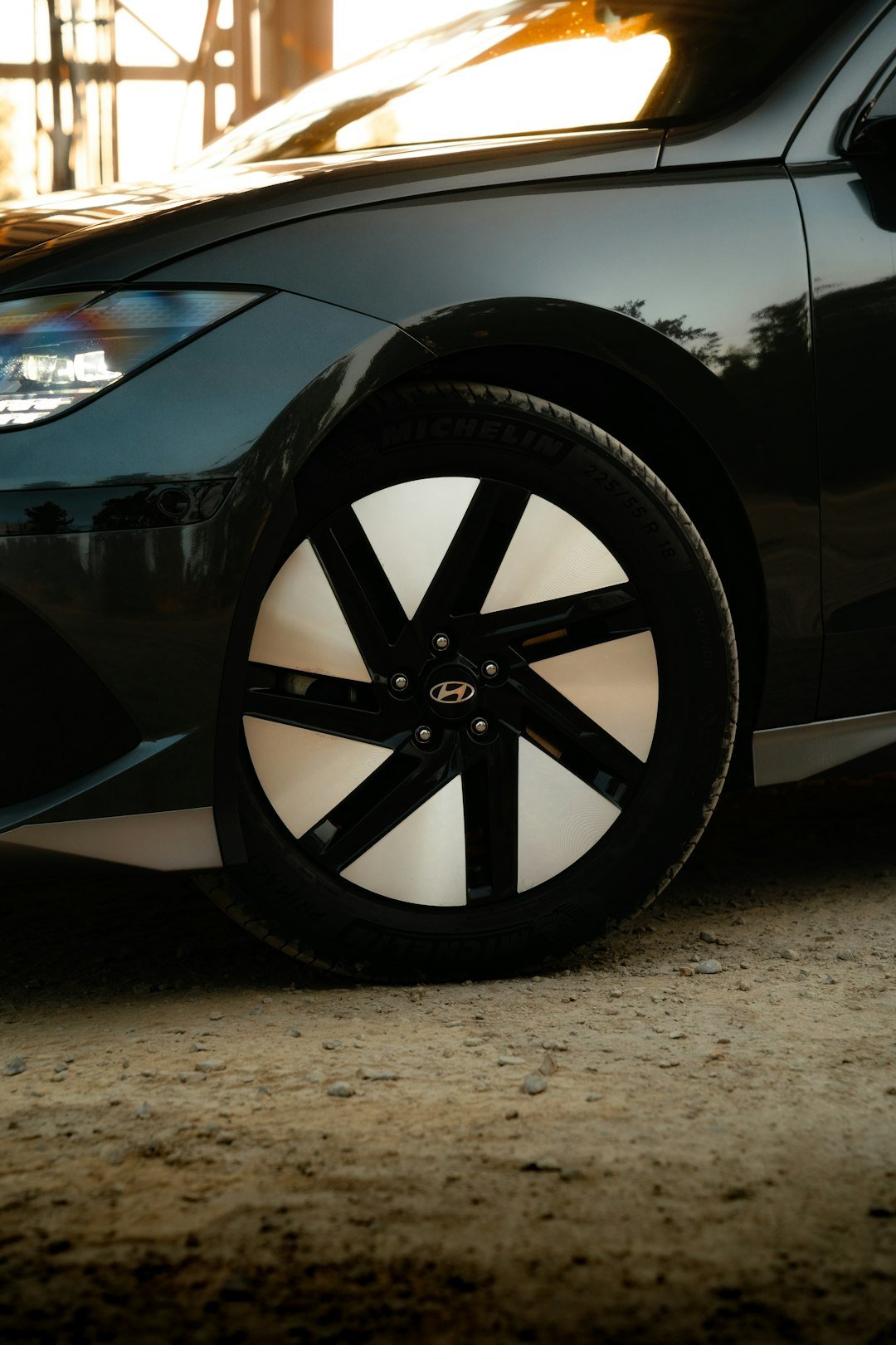 a close up of a car tire on a road