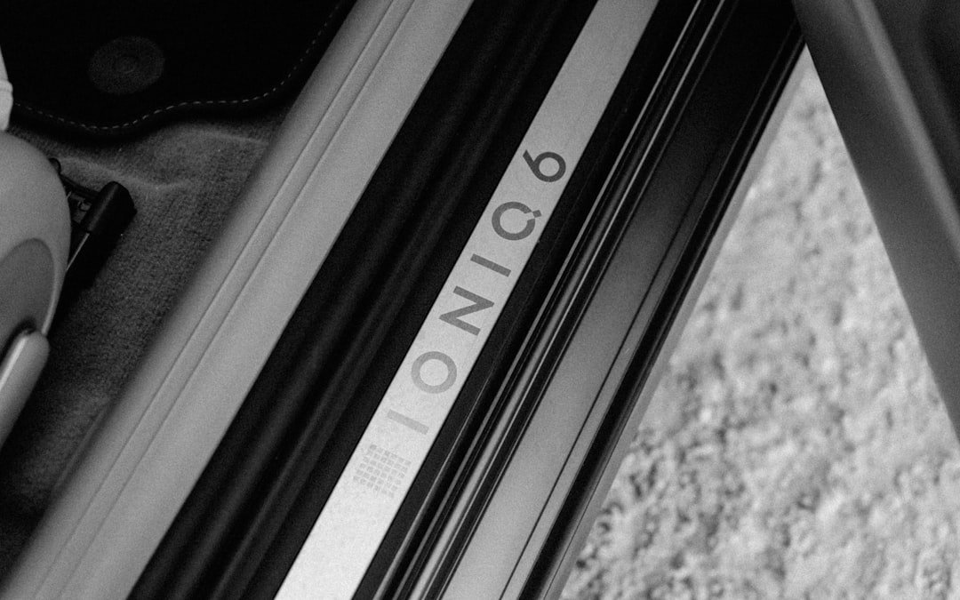 a black and white photo of a door handle