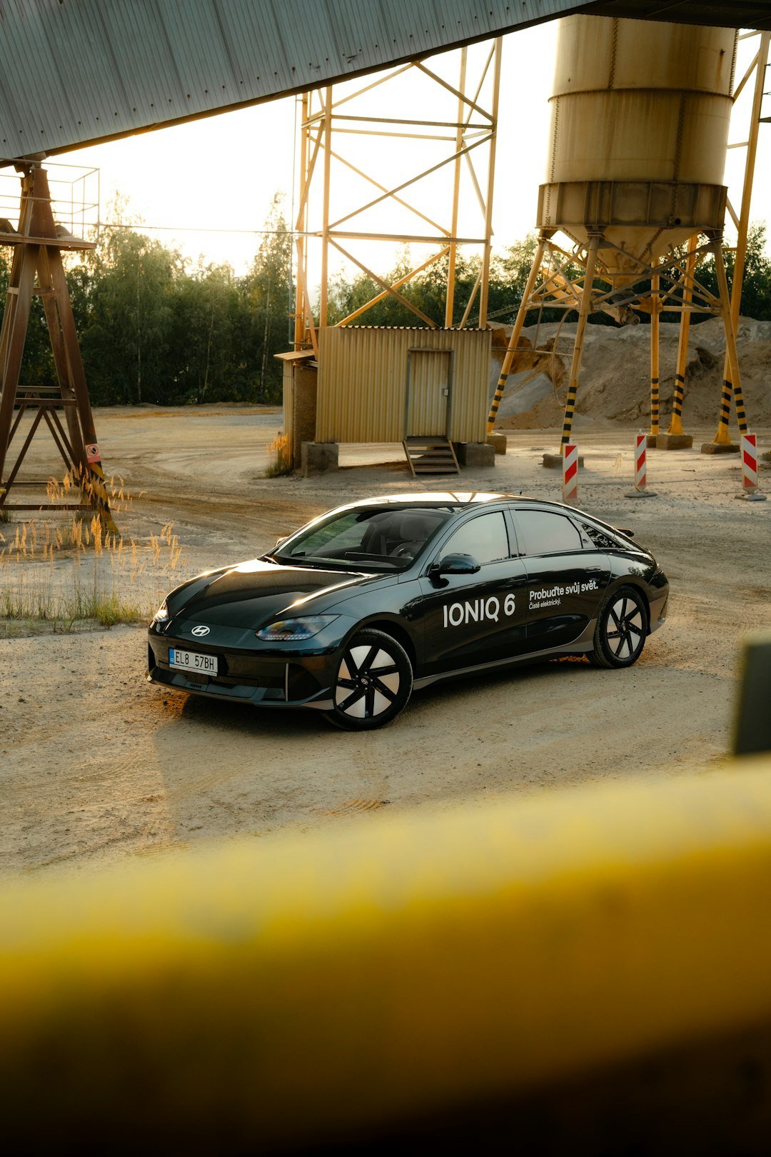 a car that is parked in the dirt