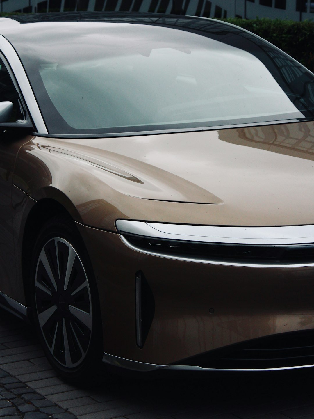 Close-up of a modern bronze electric car.